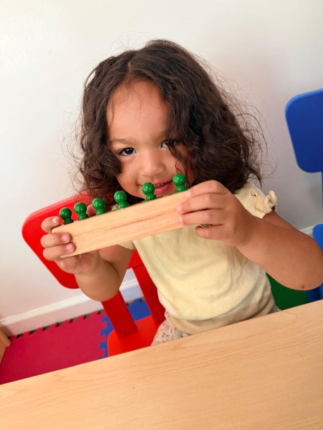 A toddler smiling at Aby Early Learning Center