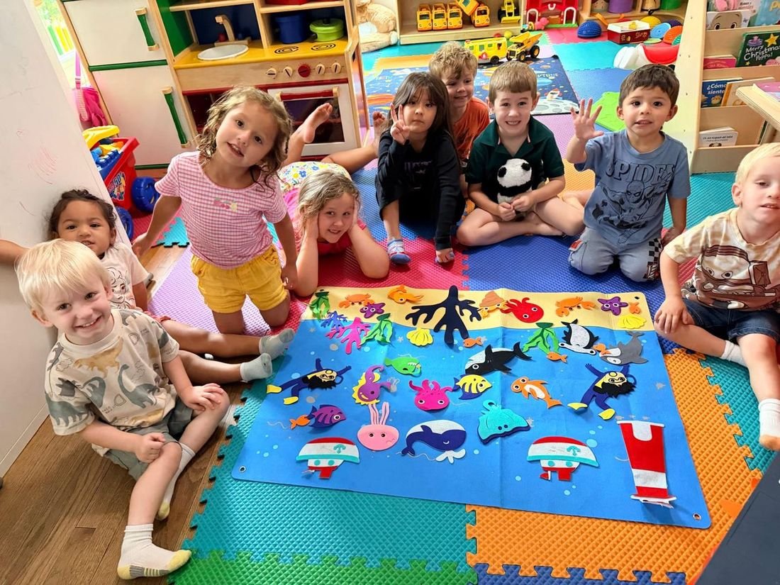 Children gathered together for circle time at Aby Early Learning Center